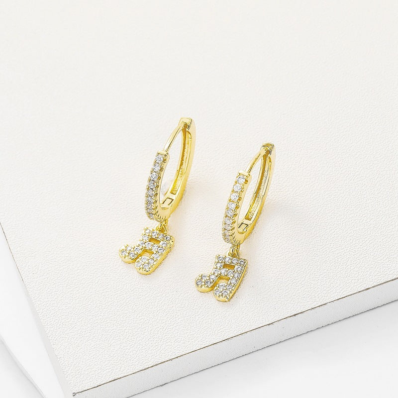 Stylish Copper Inlaid Zircon Music Note Earrings