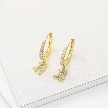 Stylish Copper Inlaid Zircon Music Note Earrings